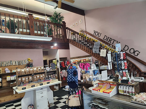 The You Dirty Dog shop floor with treats, apparel and accessories